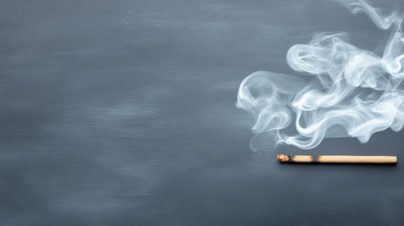 A close up of incense smoke curling into air, creating serene atmosphereの素材