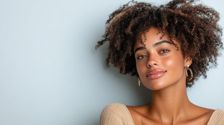 Soft curls frame radiant face, showcasing natural beauty in serene settingの素材