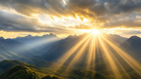 Majestic sunlight illuminating mountain range, creating serene and hopeful atmosphereの素材