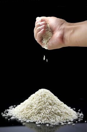 Man Holding white rice Isolated の写真素材