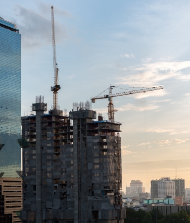 Construction site with crane and building in bangkok thailandの写真素材