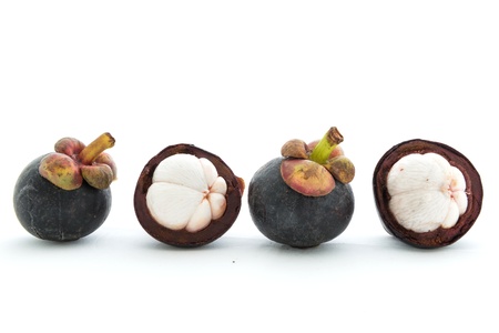 isolate mangosteen on white background, the tropical purple fruit in Thailand.の写真素材