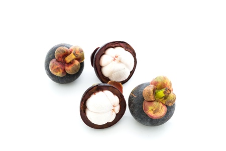 isolate mangosteen on white background, the tropical purple fruit in Thailand.の写真素材