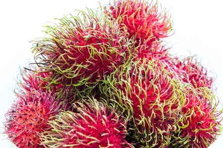 Tropical fruit, rambutan on white backgroundの写真素材