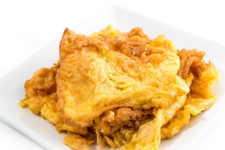 close up fried beaten egg . Thai style omeletの写真素材