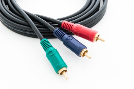 closeup audio video cable RCA to 3.5mm jack on white background