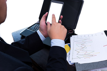 Close up of a man using mobile smart phone isolated on white backgroundの写真素材