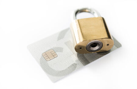 Credit cards and lock, business security on white background