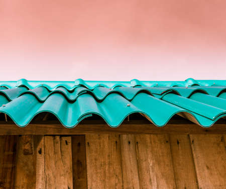 green tile roof. view from underの写真素材