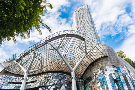 SINGAPORE - JUNE 18 : Day view of ION Orchard shopping mall onJUNE 18, 2014 in Singapore Orchard Road. The Media Facade is a multi-sensory canvas media wall made with cutting-edge technology.のeditorial素材