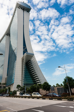 SINGAPORE - JUNE 18, 2014: Marina Bay Sands. The iconic design has transformed Singapore's skyline and tourism landscape since it opened on 27 April 2010. Designed by architect Moshe Safdie.のeditorial素材