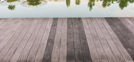 wooden pathway in the park and lagoonの写真素材
