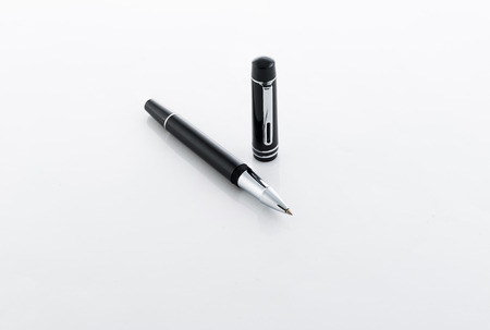 black Ball Point Pen Isolated On White with Reflectionsの写真素材