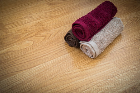 towels on wooden table. Fitness conceptの写真素材