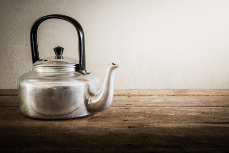 the still life old aluminium kettle. vintage toneの写真素材