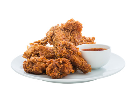 fried chicken is isolated on white backgroundの写真素材
