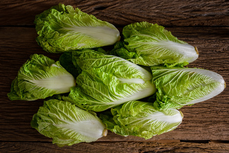 Fresh Chinese Cabbage on wooden tableの写真素材