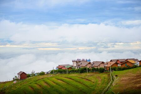PHUTHAPBOEK PHETCHABUN THAILAND - OCTOBER 10 : Resorts and lodges on the mountain with sunset at morning from view point ,Phu Thap Boek,  OCTOBER 10, 2015 in PHETCHABUN THAILANDのeditorial素材