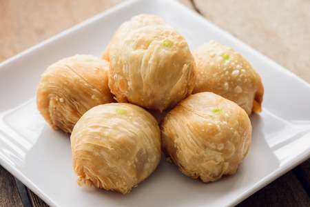 Chinese Pastry or Moon cake, dessert for Chinese on wooden table