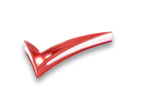 Red check mark isolated on white backgroundの写真素材