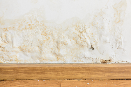 paint color swelling on old white wall. rust Damage from construction is not standard. house wall or background decoration, vintage and retro conceptの写真素材
