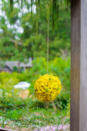 flower balls, Beautiful ornamental wreath in the shape of sphere made of natural flowersの写真素材