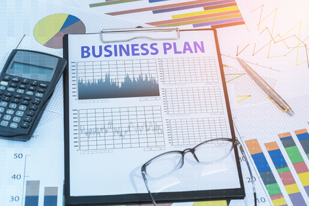 excellence in business concept on clip board with business chart. management budget planning, financial, education conceptsの写真素材