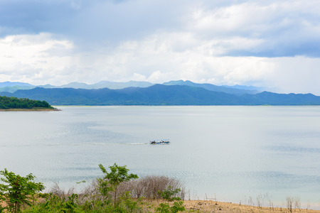 Landscape of mountain and water with Boat tour at Kaeng Krachan Dam, Kaeng Krachan National Park, Phetchaburi Provine, Thailandの写真素材