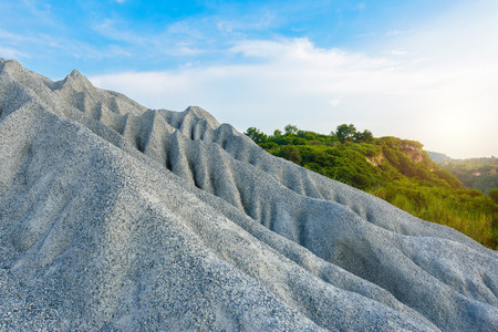 A rocky mountain or pile of fine white stone, which was mined from the mining process at "Grand Canyon Kiri" in Chonburi, Thailand. Landmark for photographyの写真素材