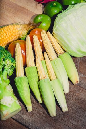 Backgroud group of fresh food tasty and healthy varis vegetables are on the wooden table
