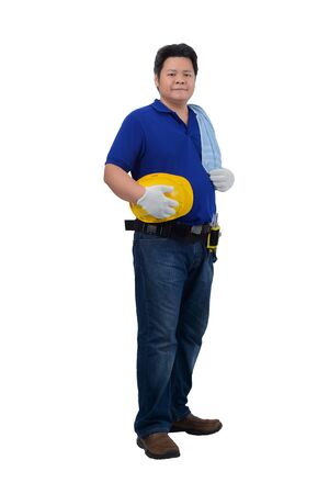 construction man workers in blue shirt with Protective gloves, helmet with tool belt isolated on white backround with clipping pathの写真素材