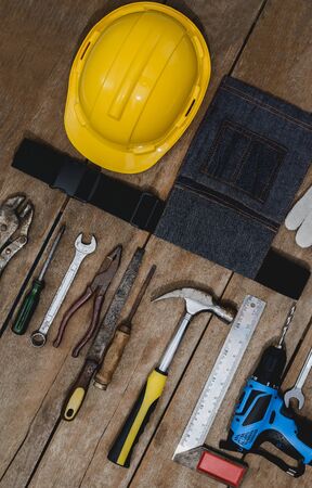 Top view of tool belt bag and old instruments constructor or renovation for build and repair house...