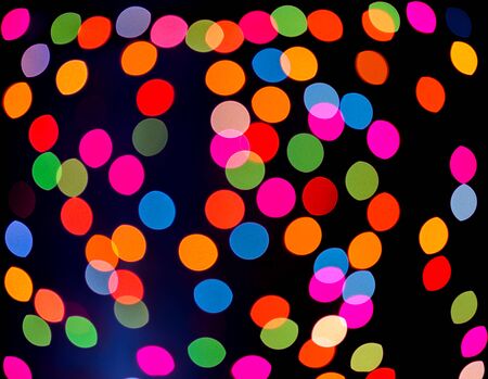 Abstract colorful defocused circular facula holiday bokeh. Abstract colorful background.の写真素材