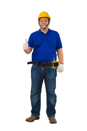 construction man workers in blue shirt with Protective gloves, helmet with tool belt and Thumbs up isolated on whiteの写真素材