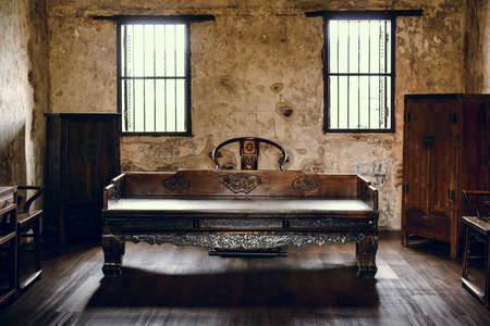 Chinese style living room with old ruins cement wallの写真素材
