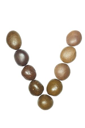 collection of letters of sea stones close-up isolated on white backgroundの写真素材