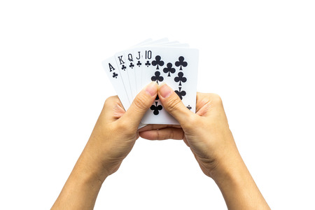 Playing cards in hand isolated on white background
