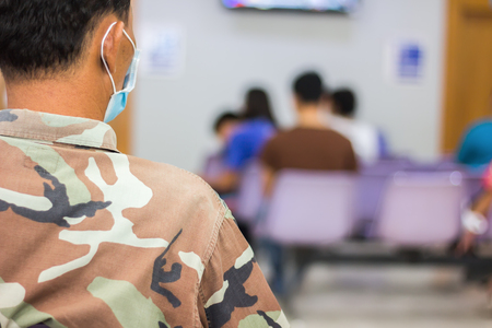 young man wearing face maskの写真素材