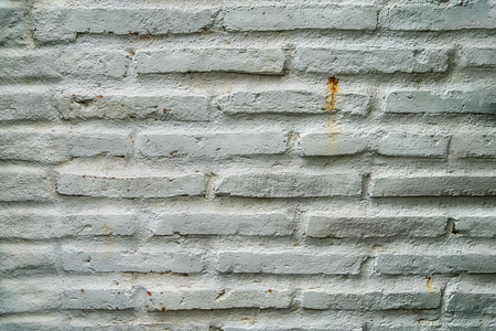 White brick wall, perfect as a background, square photographの写真素材