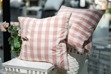 Bed with bed pillows decorative pillows quiltheadboard and nightstandの写真素材