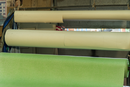 Textile factory and Colorful roll of Fabrics.の写真素材