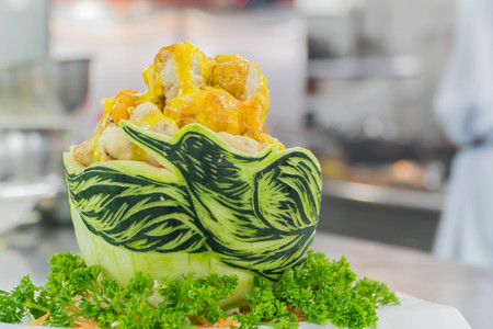 Fried chicken in watermelon Carving swan.の写真素材