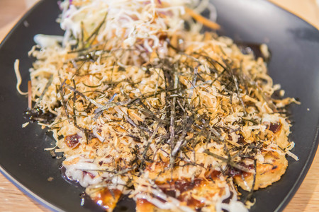 Okonomiyaki kansai style ,Japanese savory pancake or known as Japanese pizza this dish can easy to make at home.の写真素材