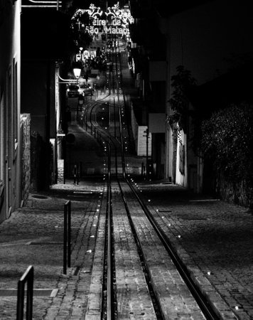 Tramway at night in Lisbon, Portugal. Black and white photo.の写真素材