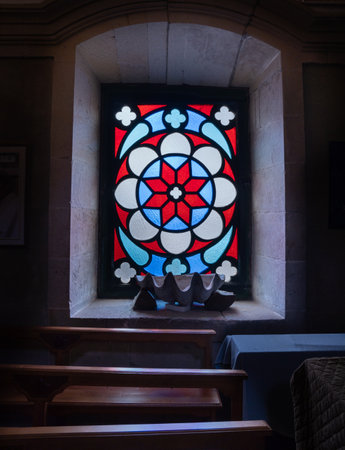Church window in the interior of the church with a stained glass windowの写真素材