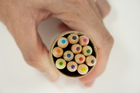 Color pencils in my hand.の写真素材