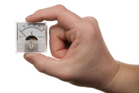 Man's hand holds a voltmeter. Isolated on white [with clipping path].の写真素材