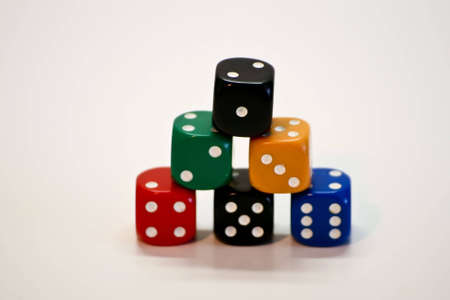 A collection of multi-colored dice.の写真素材