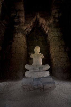Buddha image located in stone castle in thailandの写真素材