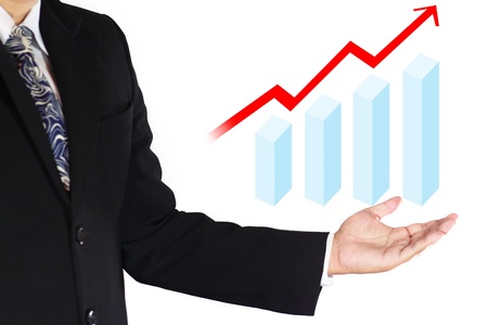 business man showing growth arrow with graphの写真素材